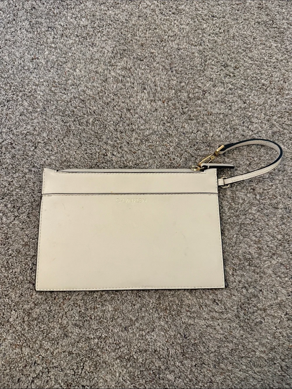 Calvin Klein Ivory Wristlet with Gold Hardware